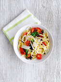 Spaghetti with cherry tomatoes and olives