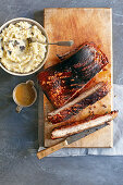 Slow-roasted pork belly with black pudding puree and mustard sauce
