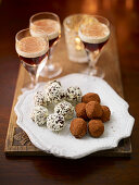Bitter chocolate truffles with cocoa and grated white chocolate