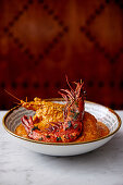 Golda chingri (king prawns in spicy potato sauce, India)