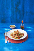 Spaghetti with chilli prawns, salami and gremolata breadcrumbs