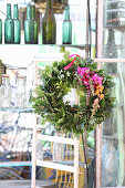 Oak leaf wreath with colourful flowers