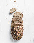 Mustard crust bread, partly sliced