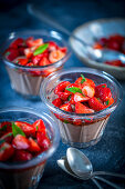 Chocolate mousse with strawberries and mint