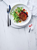 Grilled pork chop with sprout salad