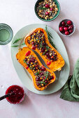 Stuffed squash with cranberries, quinoa and chickpeas