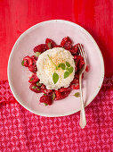 Coconut rice on marinated raspberries