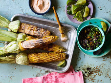 Smoky grilled corn on the cob with bean puree