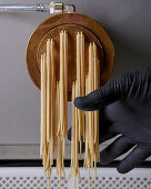Ramen noodles being made