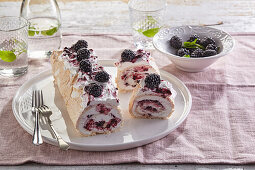 Meringue roulade with blackberries