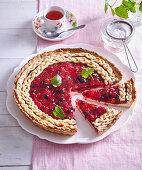 Dekorated shortcrust cake with fruits