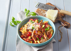 Pasta with roasted vegetables and sausages