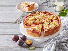 Plum cake with curd cheese and crumble