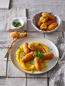 Root vegetable croquettes with pumpkin puree