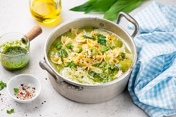Creamy potato and wild garlic soup with farfalle