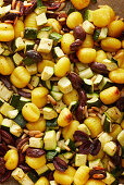 Tray bake vegan gnocchi with courgette and olives (full frame)