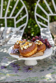 Doughnuts with lilacs and grapes
