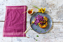 Baked pumpkin with red cabbage salad