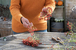 Heart of rose hips on a bent wire wreath blank