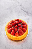 Baked cheesecake with glazed strawberry topping