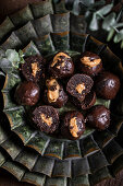 Healthy energy balls with peanut caramel filling
