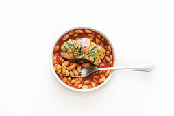 Tuscan monkfish with white beans in tomato sauce