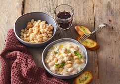 Creamy white beans with herb crostini