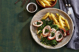 Rabbit roulade with spinach and potato noodles