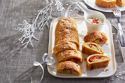 Spicy mini strudel with ham and vegetables