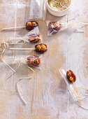 Dates on a stick filled with caramel nuts
