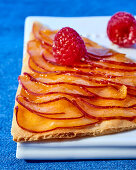 Peach tart with raspberries