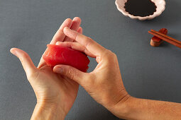 Preparing Nigiri Sushi with salmon