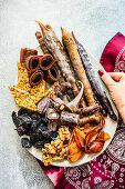 Georgian dessert plate with dried fruits, nuts, and churchkhela