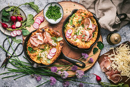 Mini Dutch-Baby with cheese, prosciutto and radishes