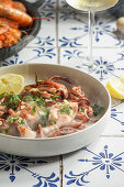 Grilled squid with garlic and lemon juice, parsley