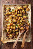 Bowl of baked herb potatoes