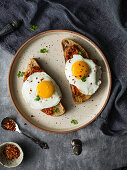 Fried egg and romesco sauce served on toasted sourdough bread