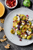 Roasted Brussels sprouts salad with pomegranate, feta, and walnuts