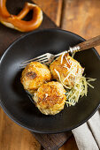 Cheese and pretzel dumplings with Emmental cheese