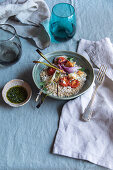 Couscous mit Blumenkohl, Tomaten und Ricotta aus Schafsmilch