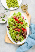 Spring salad of wild garlic crêpe rolls