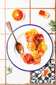 Blood orange salad with syrup and fresh rosemary
