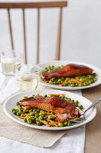 Salmon with soy glaze on pea-carrot-edamame salad