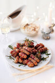 Sticky sausage and rosemary skewers
