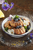 Small lemon ricotta cakes with blueberries