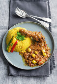 Couscous mit Huhn und grünen Oliven (Senegal)