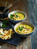 Pea and Ham soup with Roasted parsnip crisps