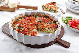 Spinach quiche with tomatoes and bacon