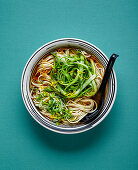 Miso ramen with asparagus, spring onions and lemon zest