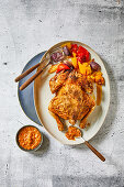 Oven-roasted chicken à pattes bleues with vegetables